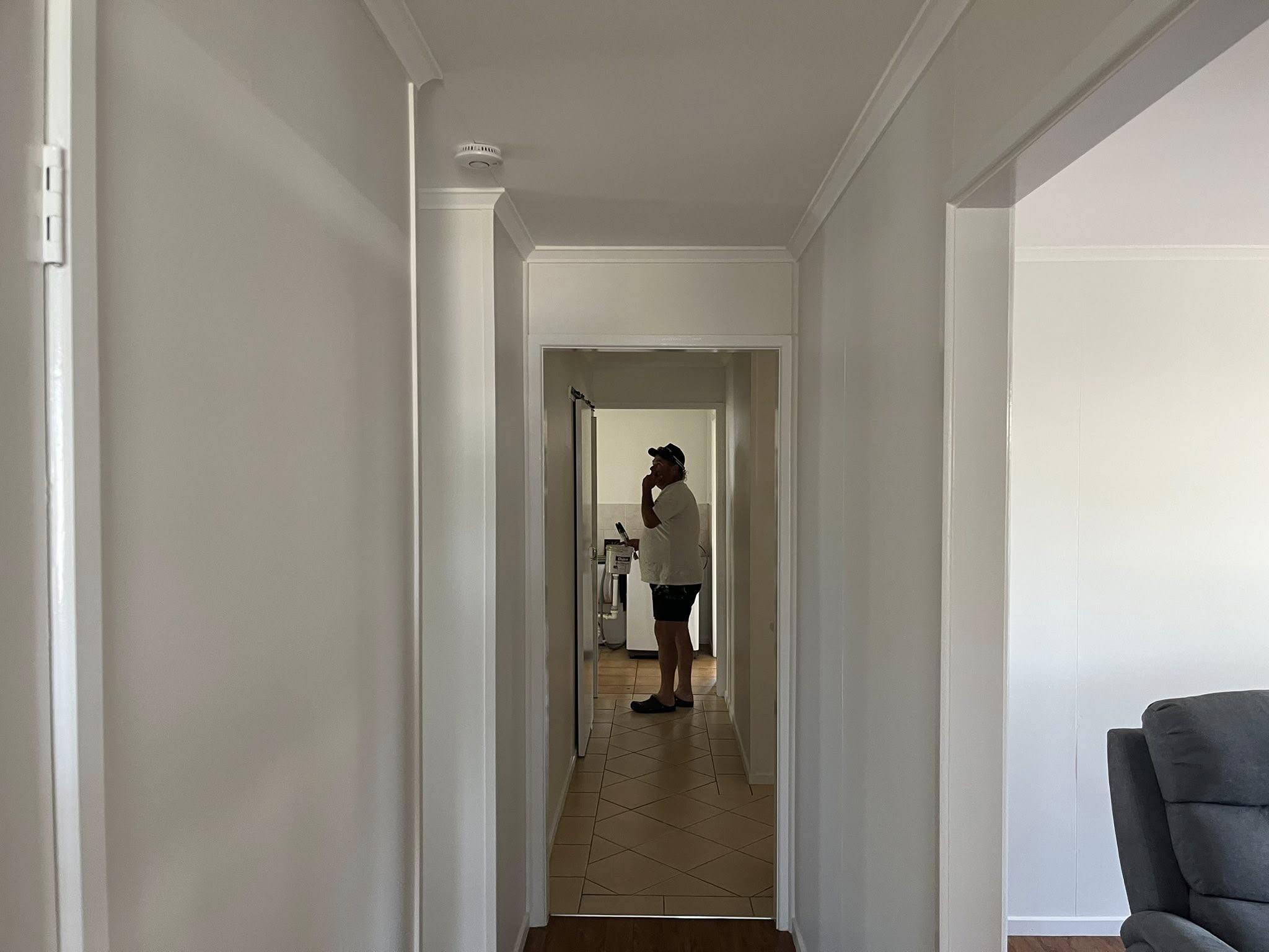 Our team painting an interior room in Queensland